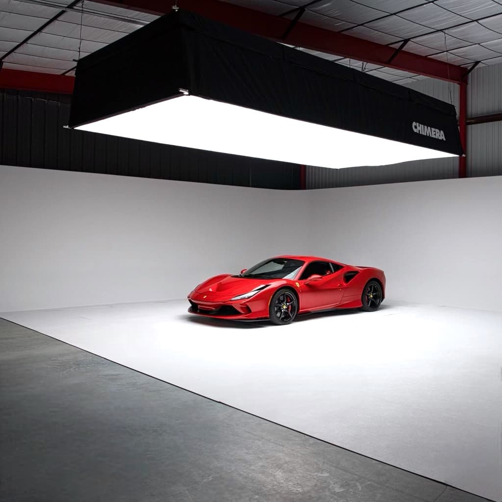 Red Ferrari in professional photography studio at The Asylum